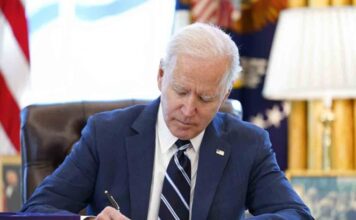 Biden promulga plan económico de 1.9 billones de dólares
